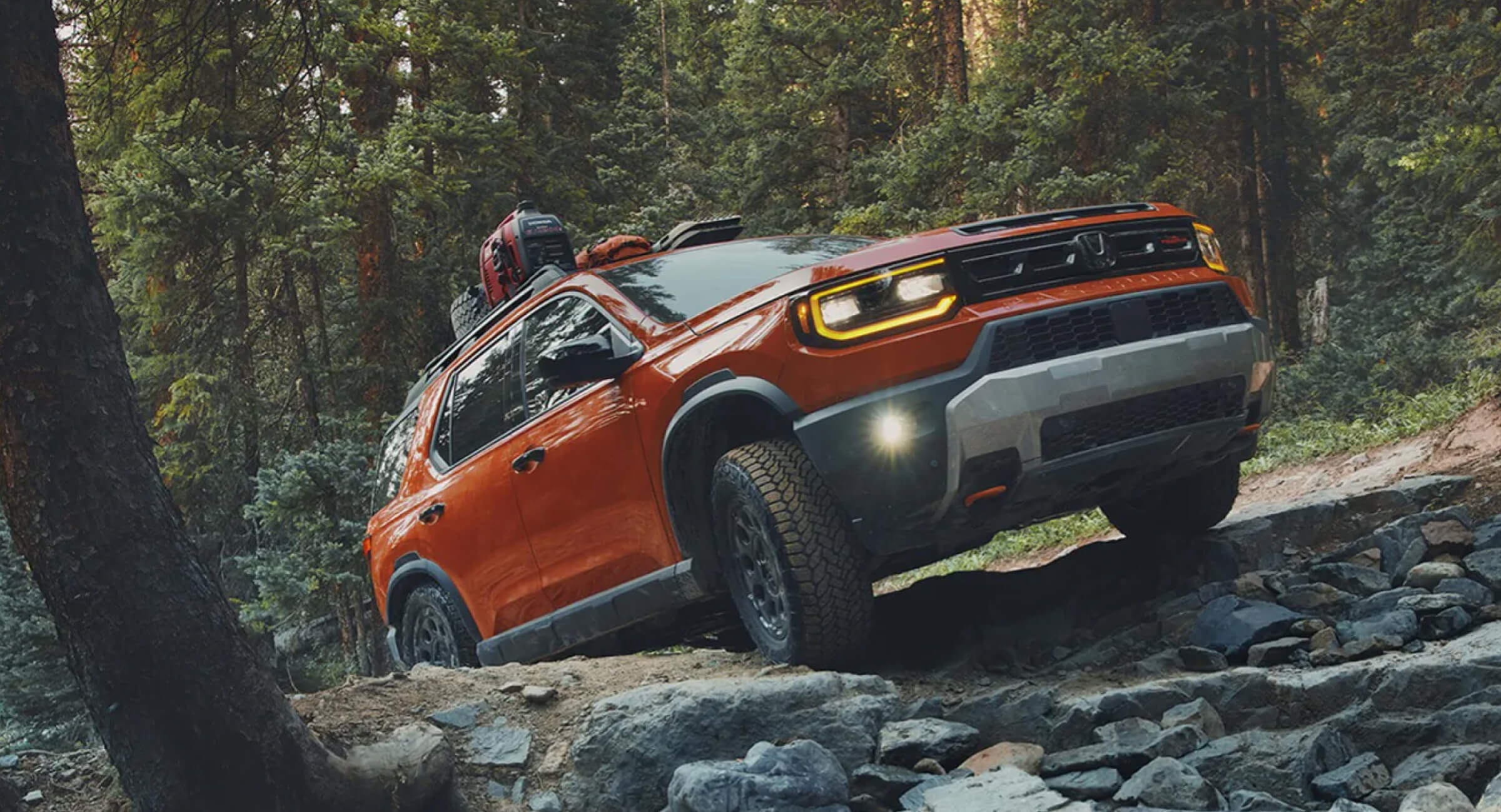 2026 Honda Passport driving off road.