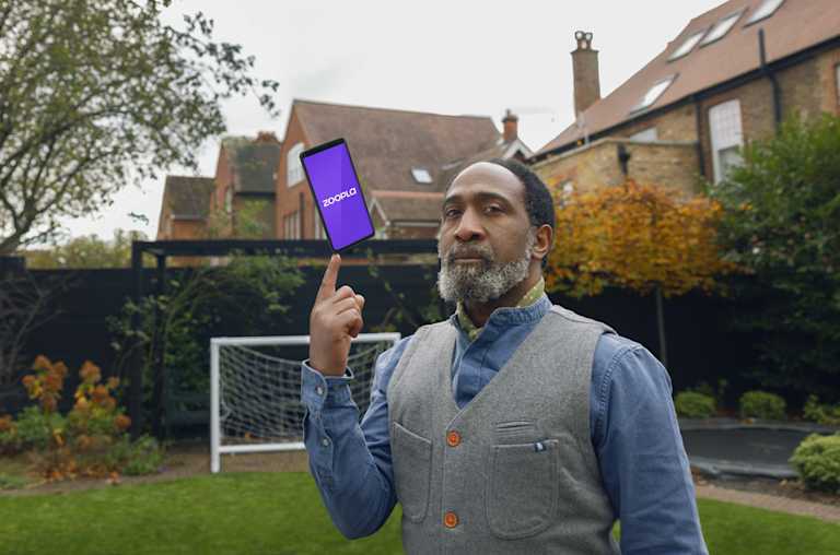 A man spinning a phone on his finger