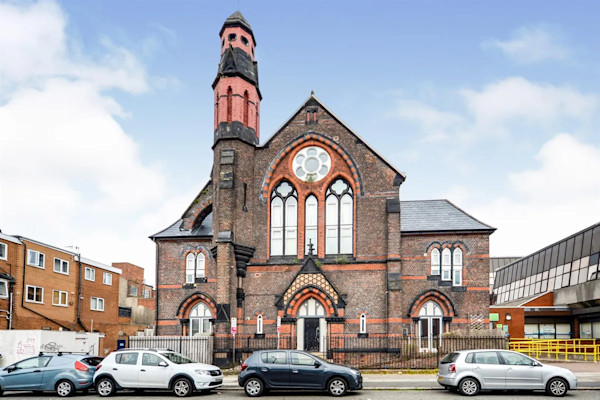 The front of the church, which has been converted into homes
