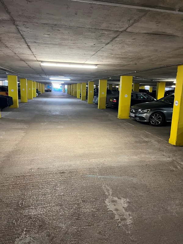 Cars parked in underground car park at Napier Court