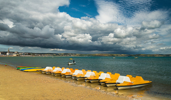 pedalos on a Dorset beach