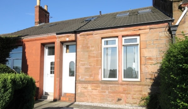 Terraced stone cottage in Wishaw