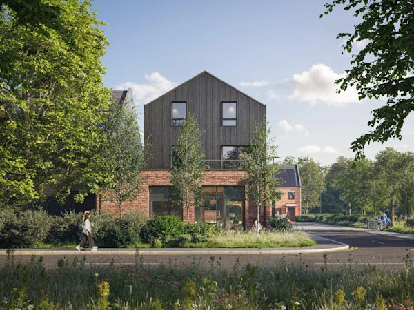 The exterior of a modern energy-efficient new-build home in Epping with brick and black cladding