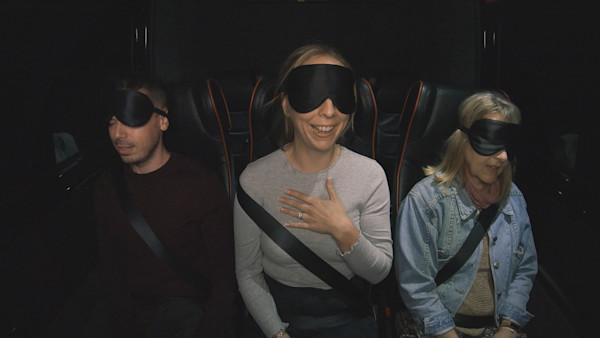 Contestants on Perfect House, Secret Location, blindfolded in a van en route to a property viewing