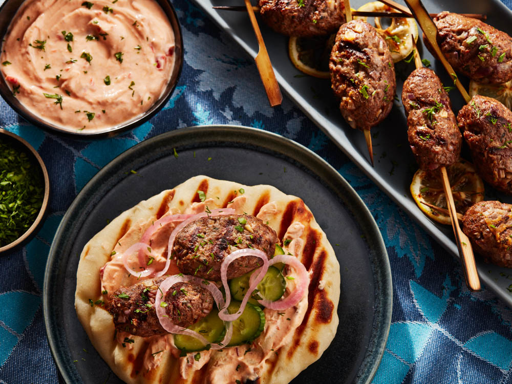 Cheese herb flatbread with spiced lamb kebabs