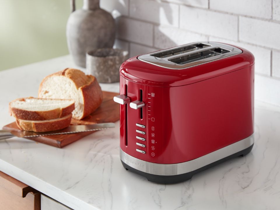 Toaster-2-slice-5KMT2109-empire-red-on-countertop