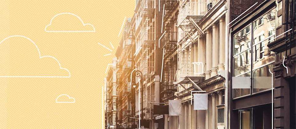 facade of buildings on a yellow background and drawn graphic clouds