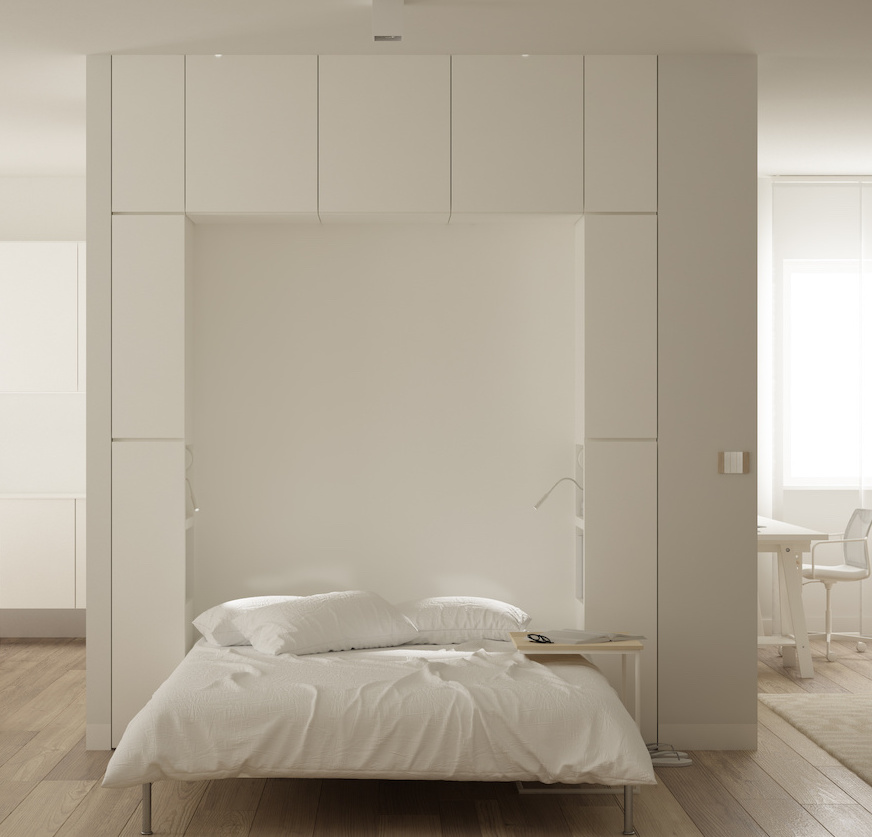 Murphy bed in a white living space. 