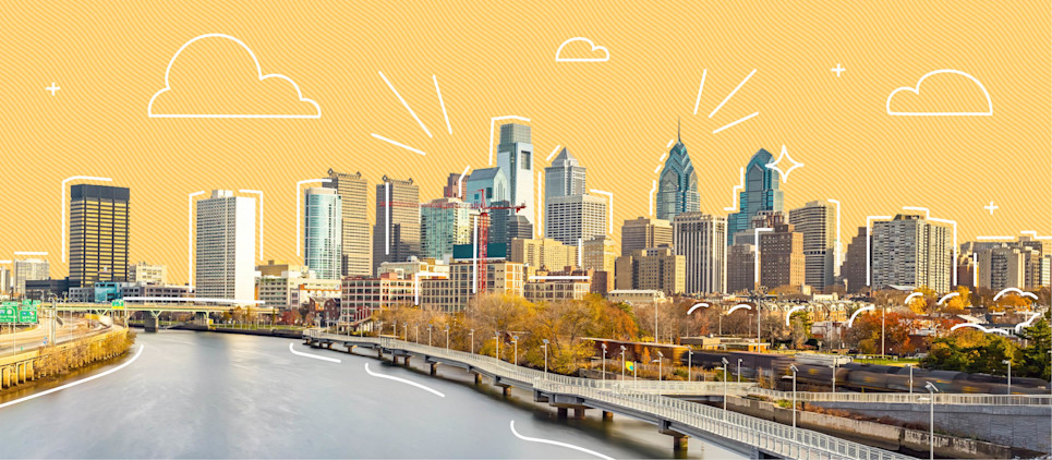 Picture of the city of Philadelphia alongside a river.
