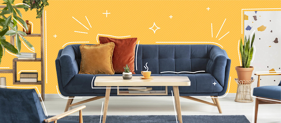 Mid-century modern living room with blue couch and coffee table.