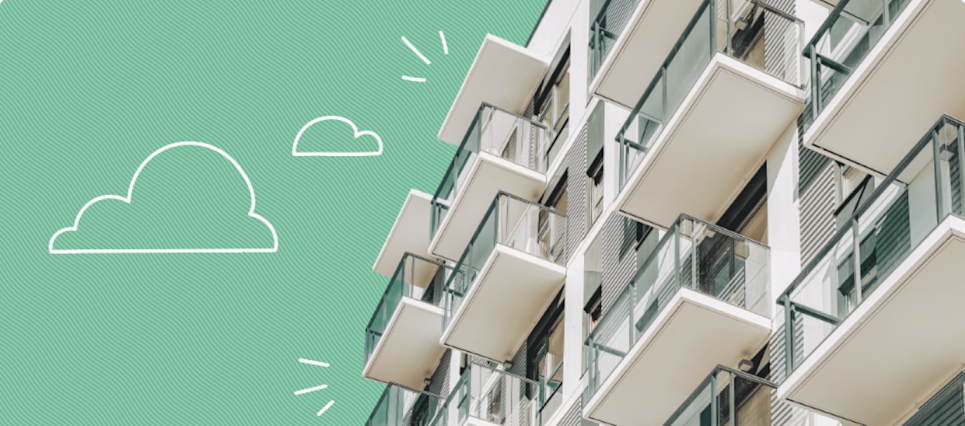 Condominium units against a blue sky