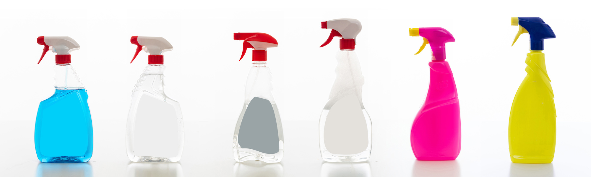 Images of multiple cleaning spray bottles.