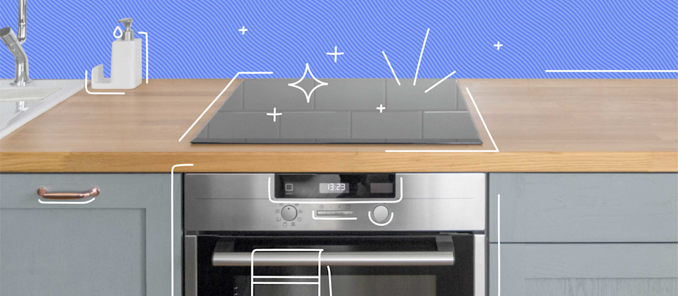 glass stove top with wood countertop on blue background