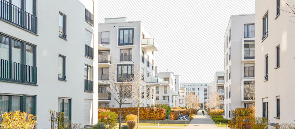 Row of apartment complexes facing each other.