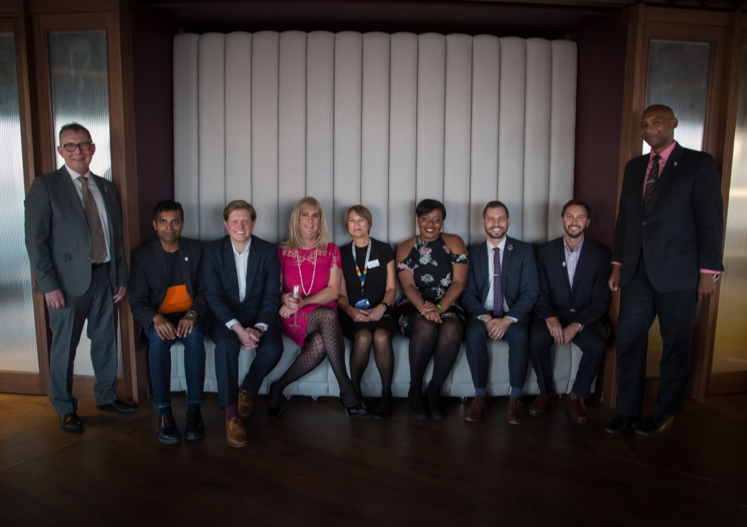 Group photo of pride in the city and outstanding meeting speakers