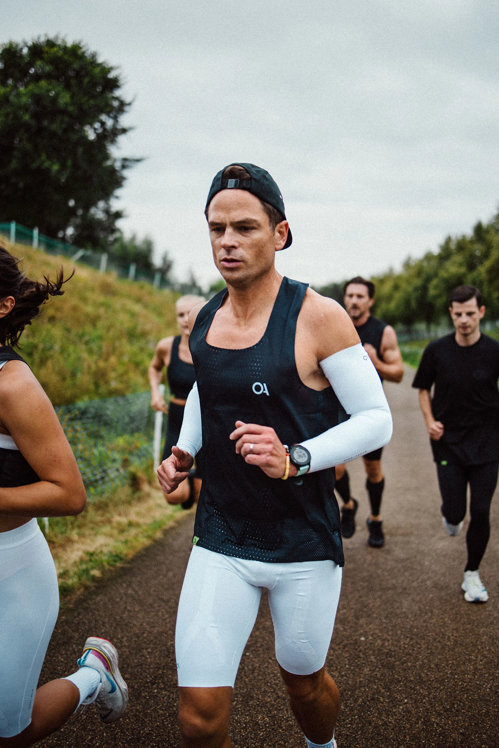 Man wearing compressive half tights and sleeves