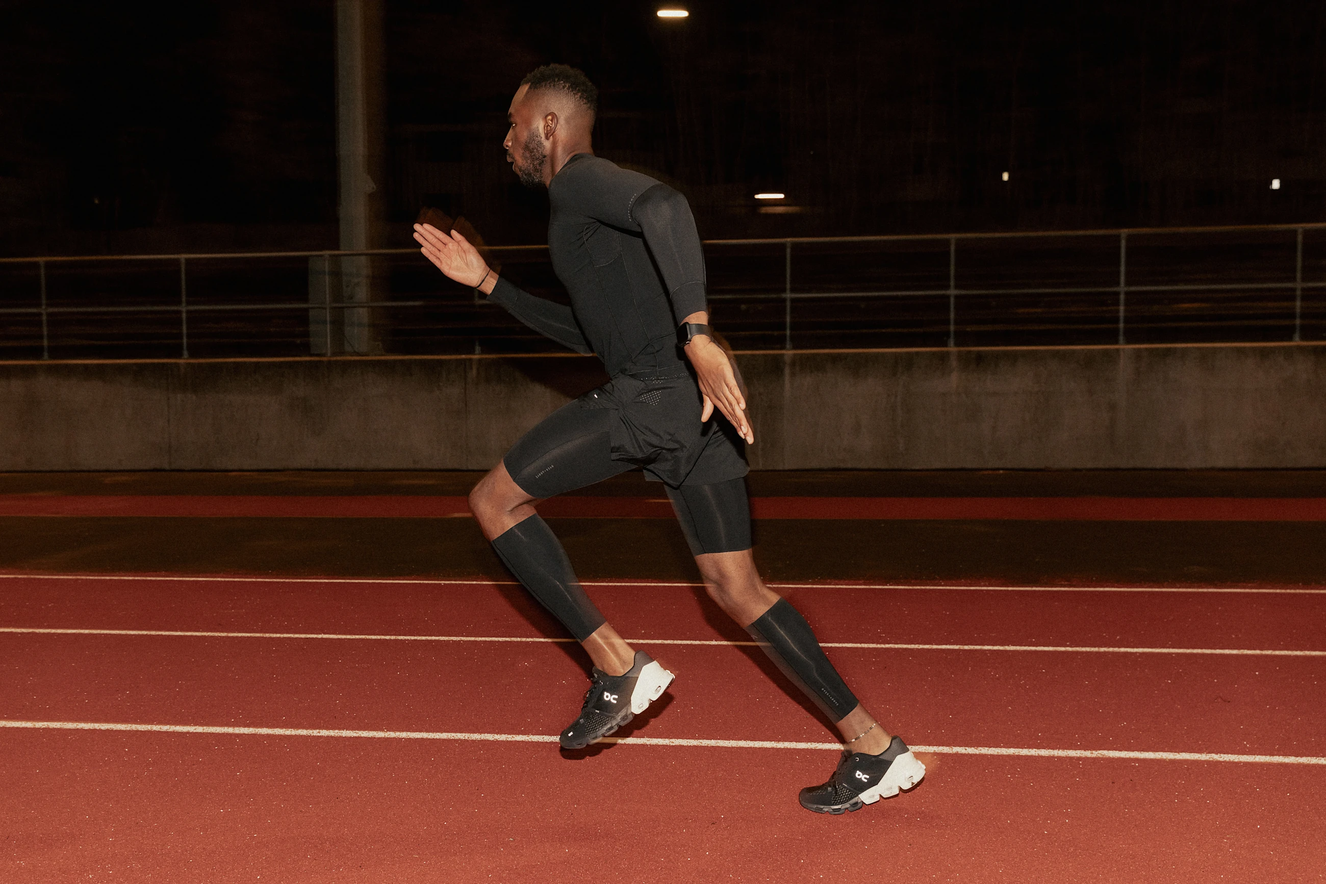 A Man Running In Compression Gear