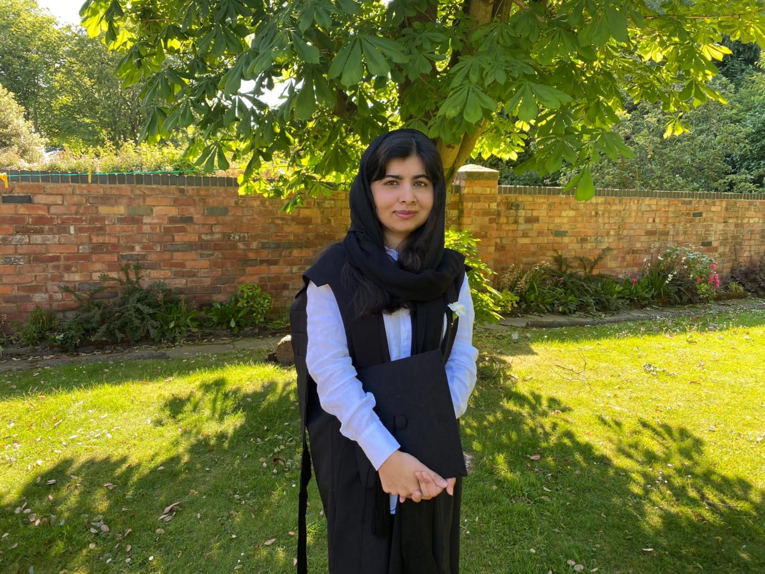 Malala in a gown for her graduation.