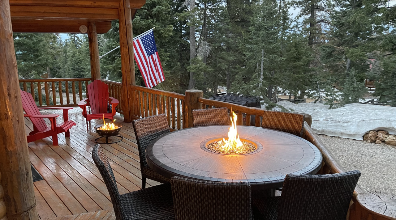 Enjoy the cool mountain air while sitting around the gas table to enjoy a meal or drink outside! Circle up the red chairs around the propane fire bowl on deck or the Solo Stove Wood Burning Fire pit out front. Deck seating for 10!