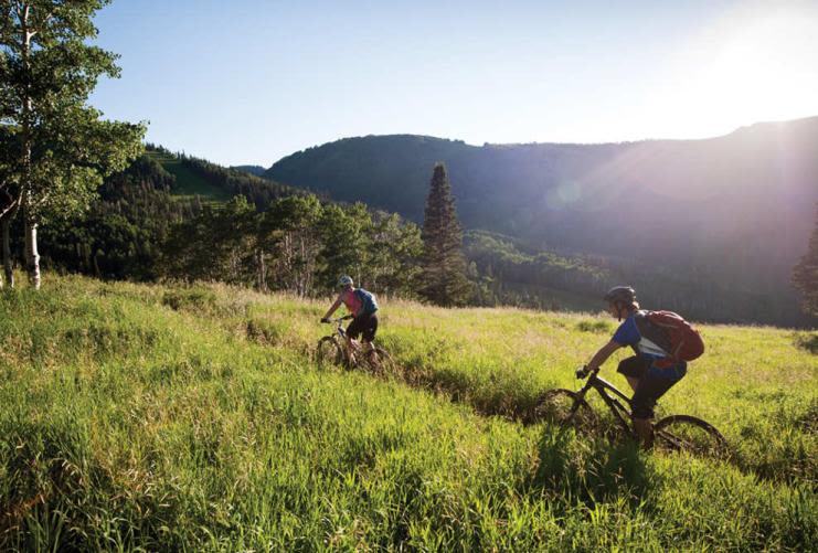 Park City | Photo Gallery | 0 - Bikers riding in a Utah Meadow