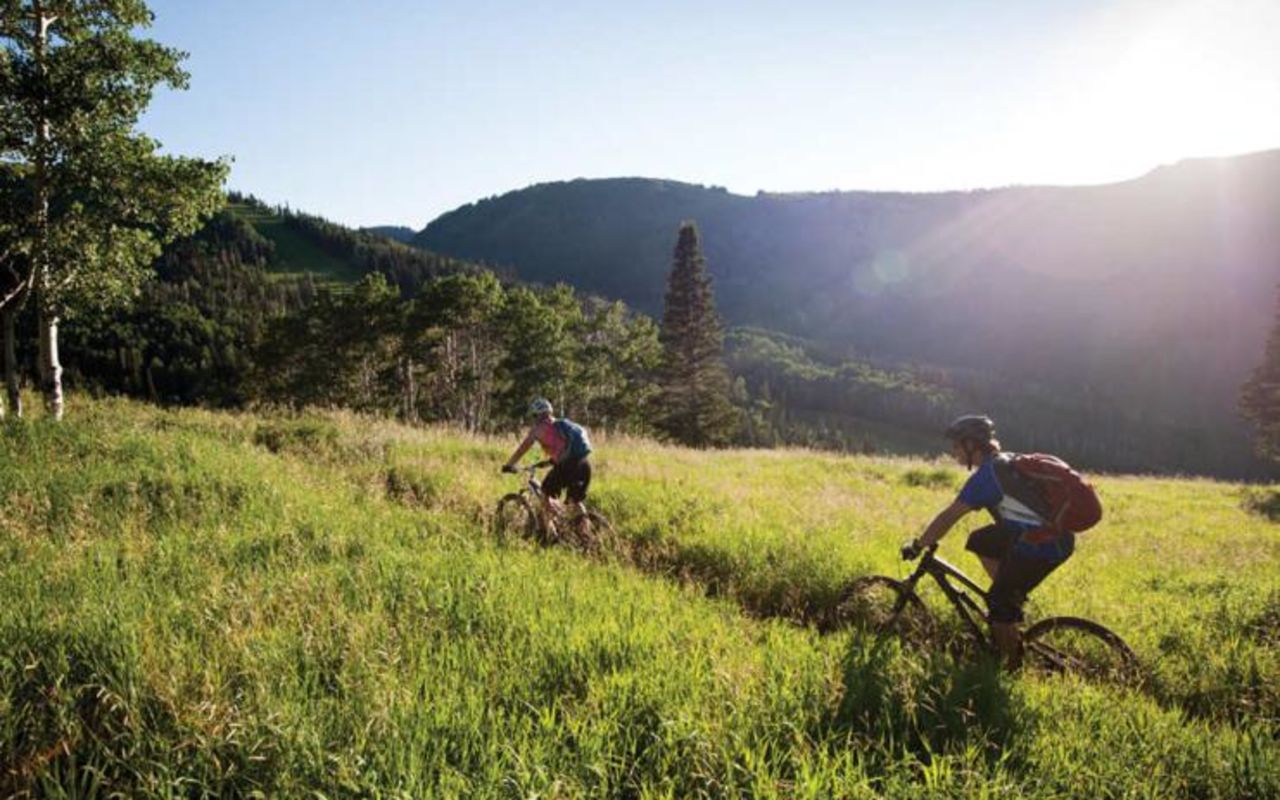 Park City | Photo Gallery | 0 - Bikers riding in a Utah Meadow