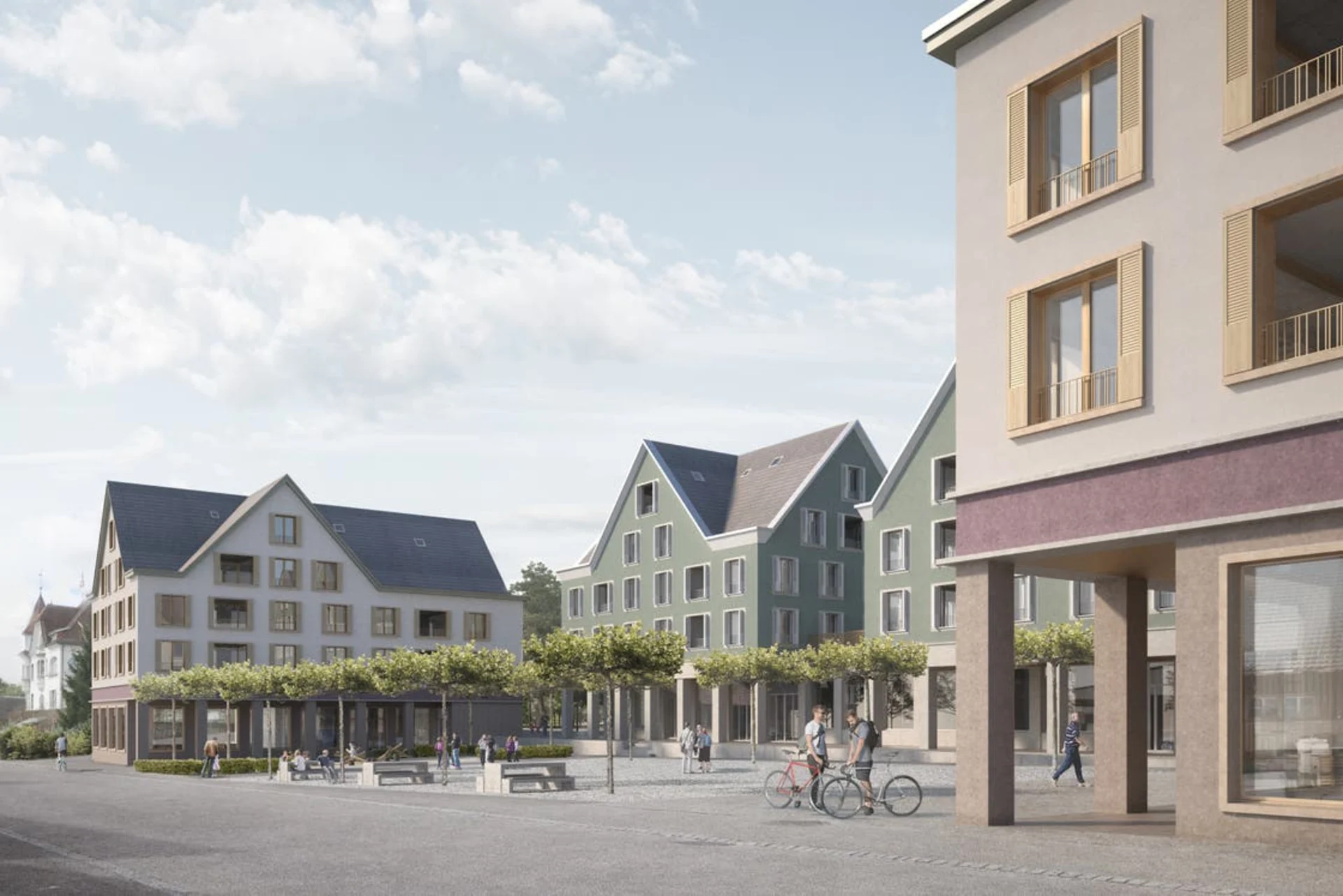 Der Eingang zum Migros-Supermarkt befindet sich im linken der beiden grünen Gebäude.