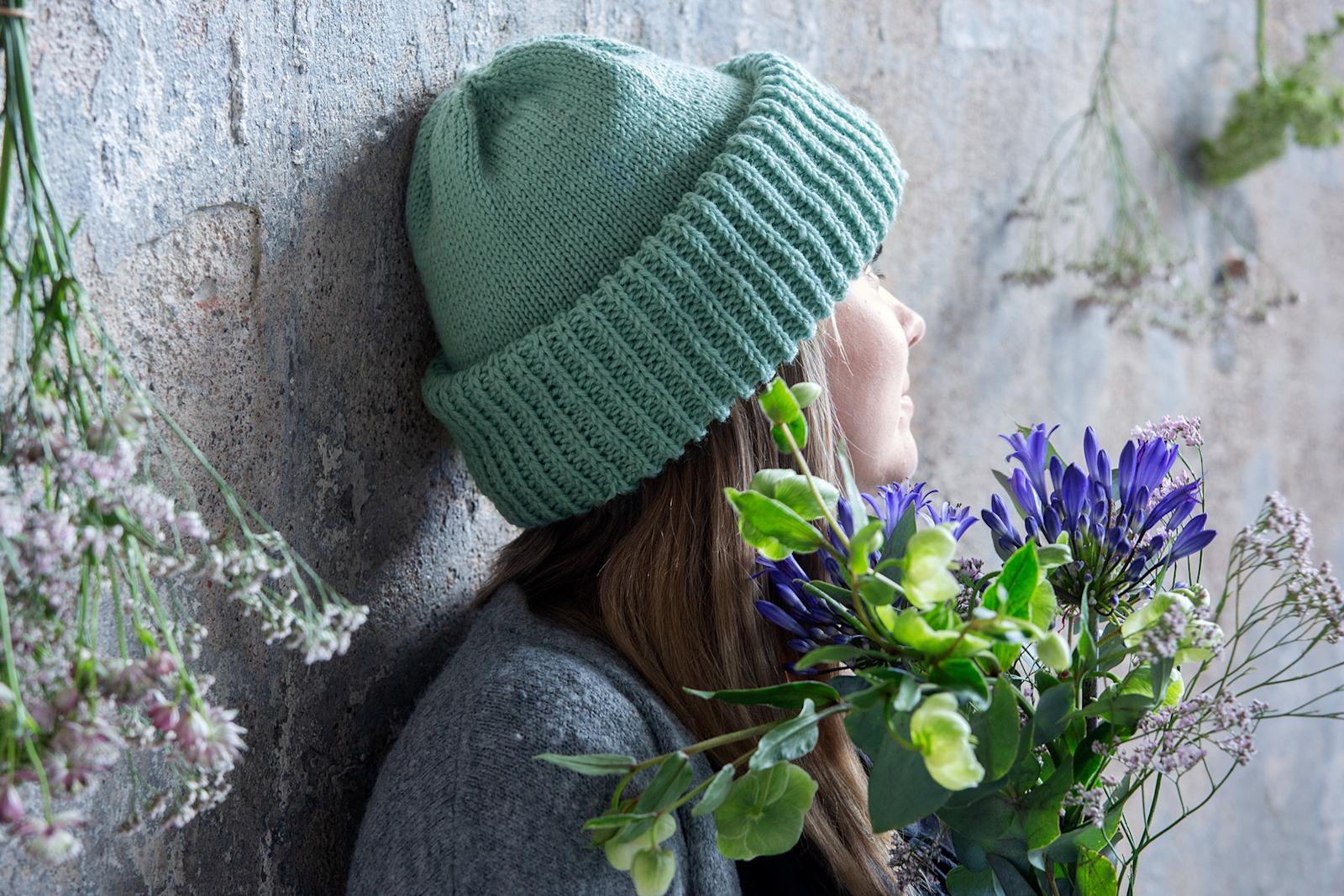 Muhkupipo naisen päähän puettuna