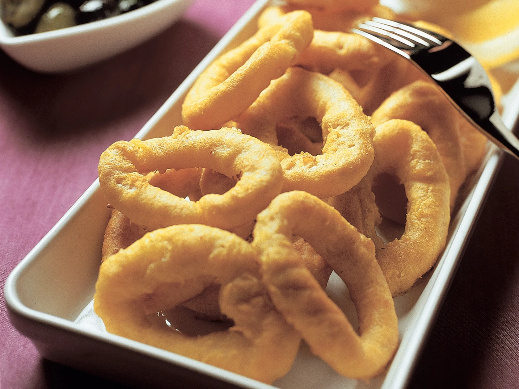 Friteeratut mustekalarenkaat