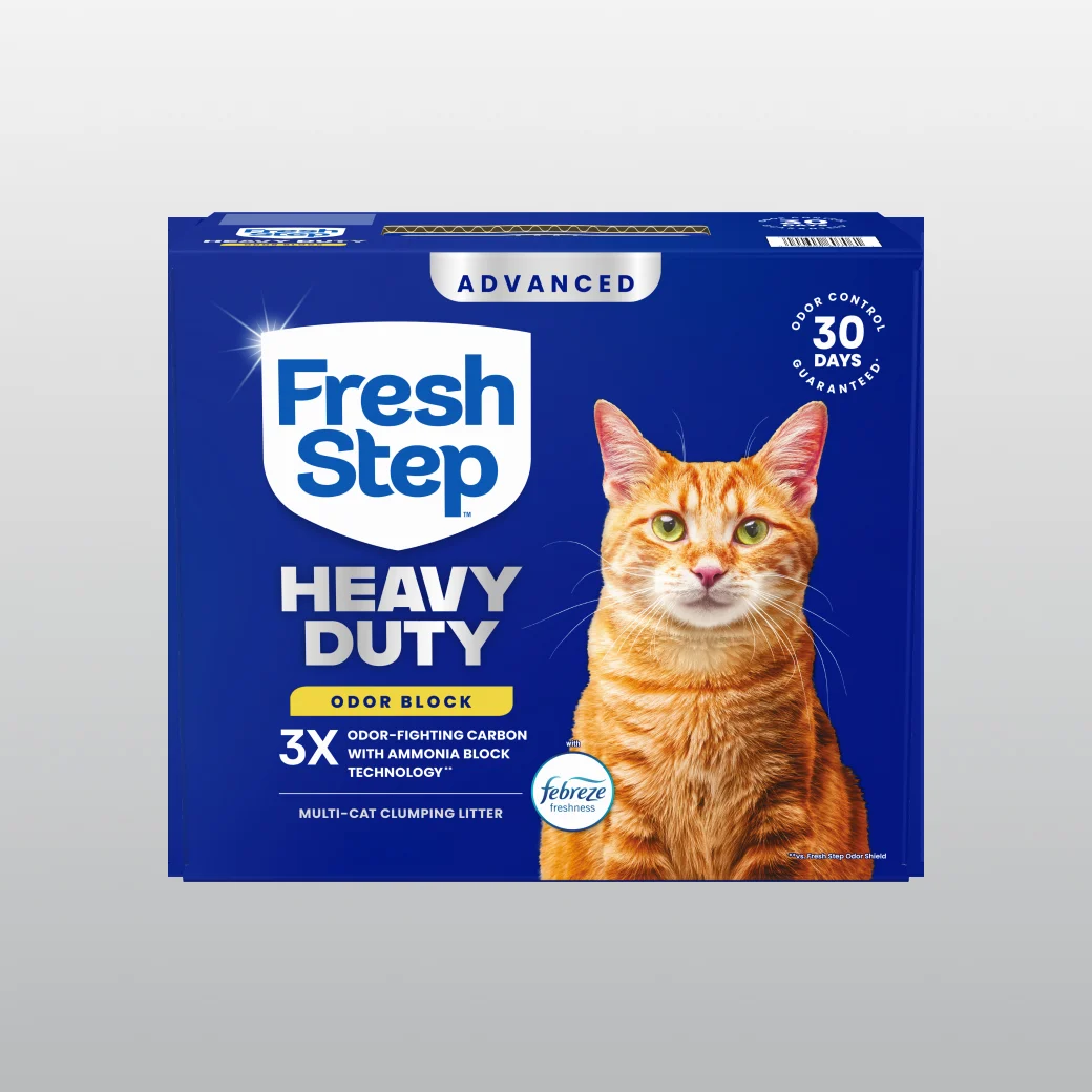 A carton of Fresh Step Heavy Duty advanced on a gray background