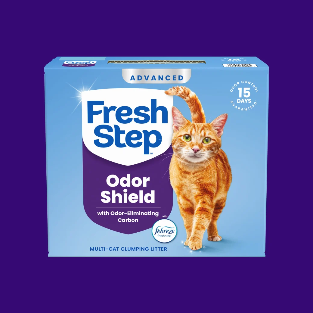 A carton of Fresh Step Advanced Odor Shield on a purple background