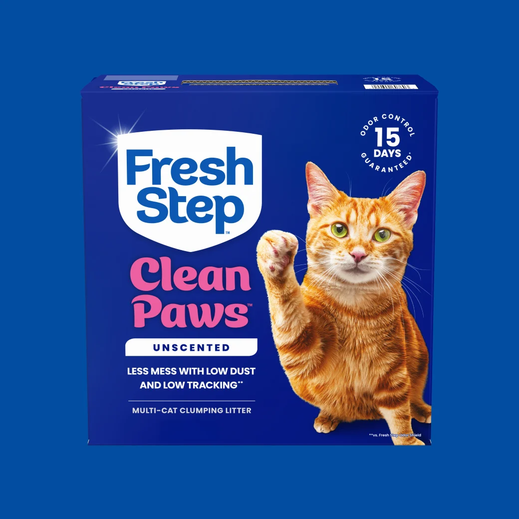 A carton of Fresh Step Clean Paws unscented on a blue background