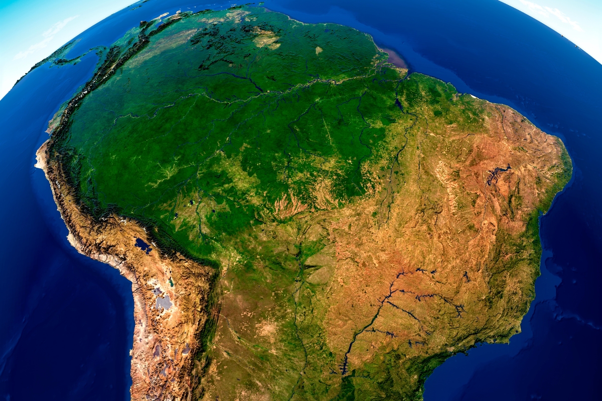 A satellite view of South America reveals the immense scale of the Amazon Rainforest.