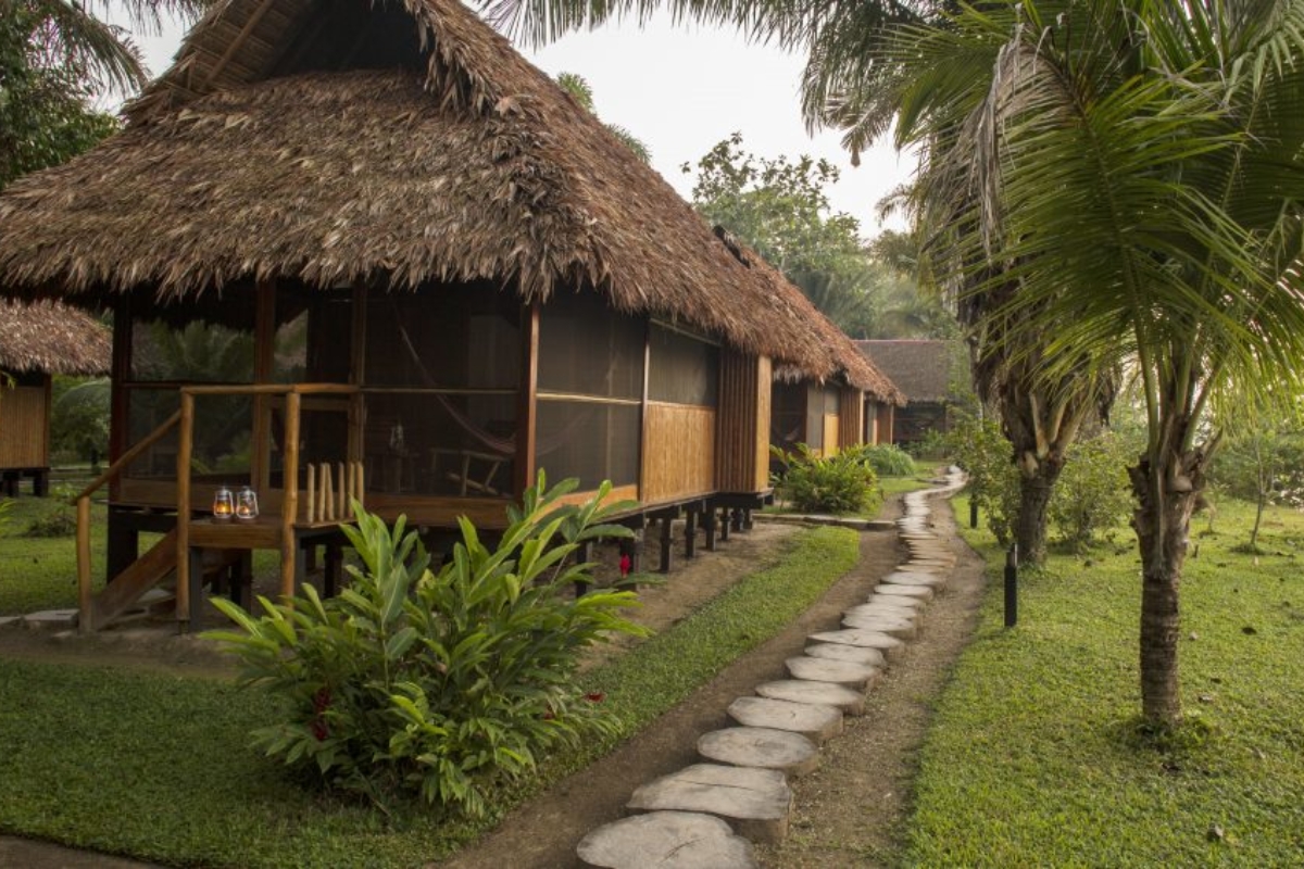 Eco-friendly cabanas at Inkaterra’s Amazon lodge in Peru, where comfort meets conservation in the heart of the rainforest. (Photo: Inkaterra Reserva Amazonica)