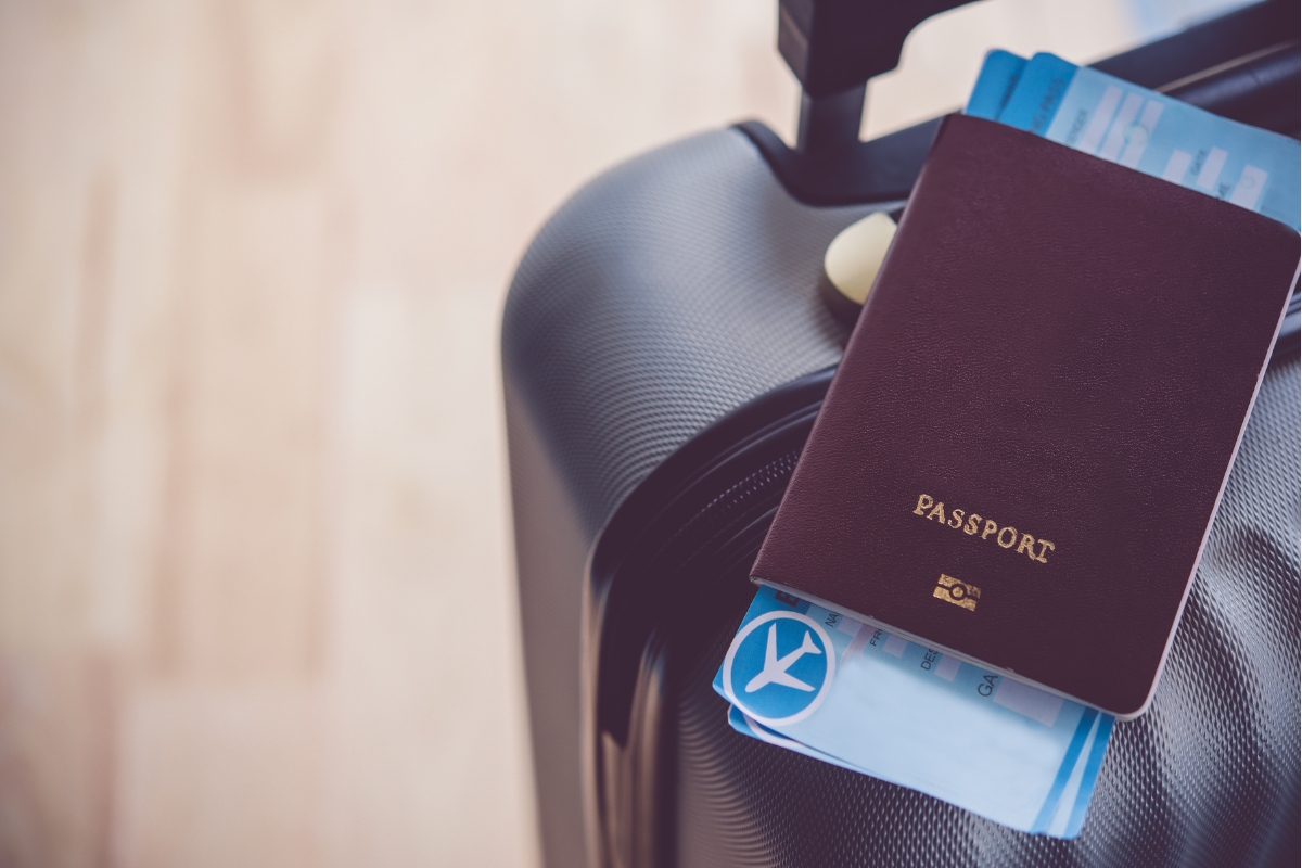 Passport and Tickets on a Suitcase