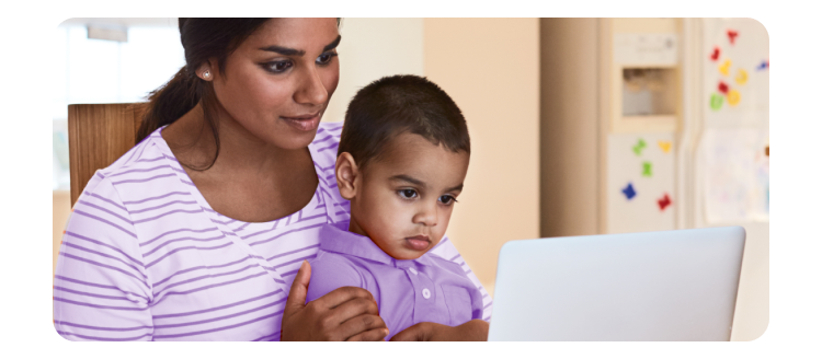 Woman and kid using a computer