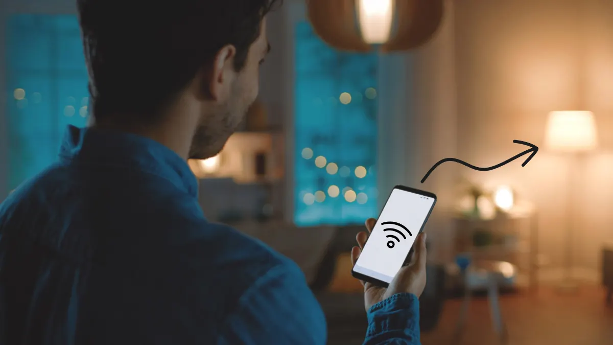 Man pairing smart light bulbs with Wi-Fi