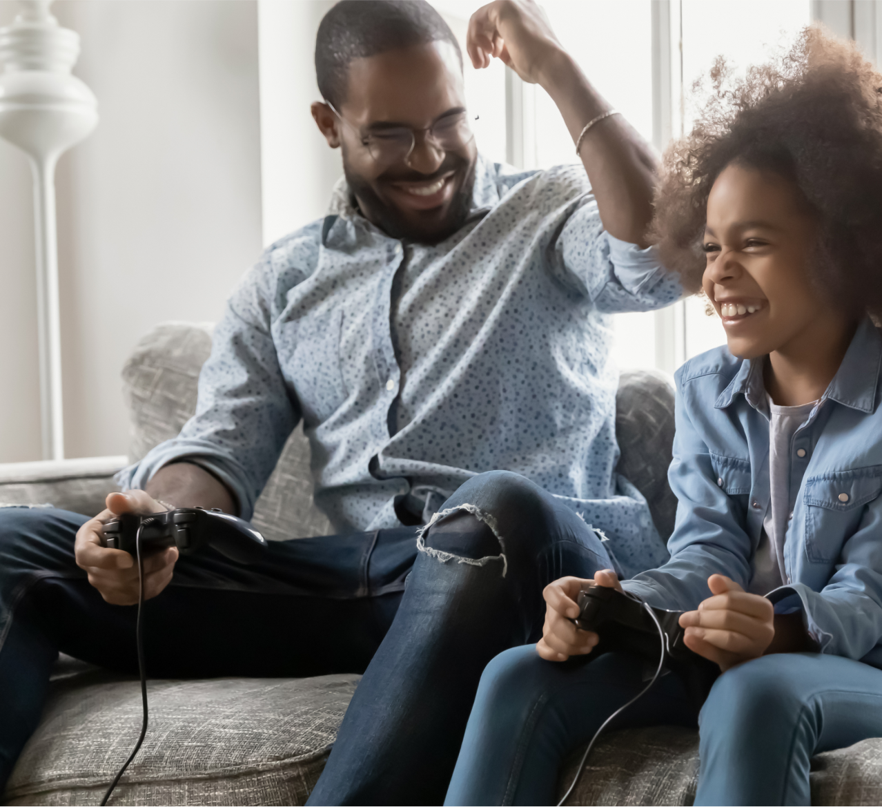 Father daughter playing video game