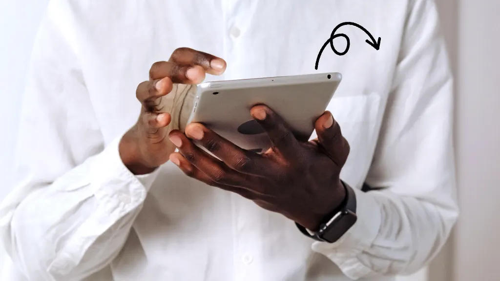 Man backing up data on his digital tablet