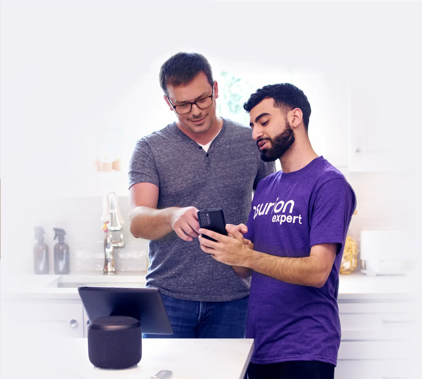 Asurion expert helping customer in home