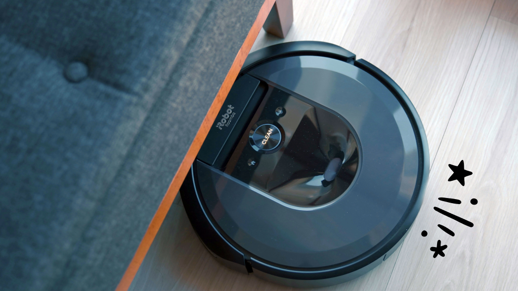 Roomba vacuuming under chair