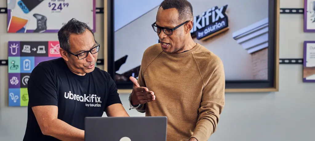 Employee assisting customer