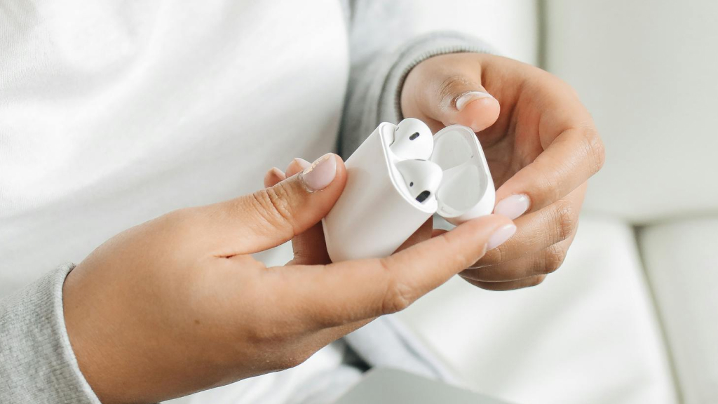 AirPods Ringing in the Case in woman's hands
