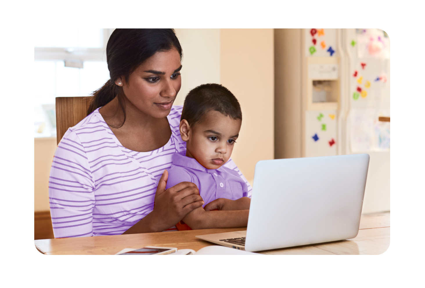 Woman and kid using a computer