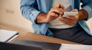 Man scrolling through phone