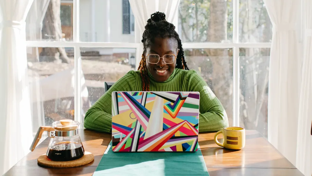 Woman working on backing up laptop