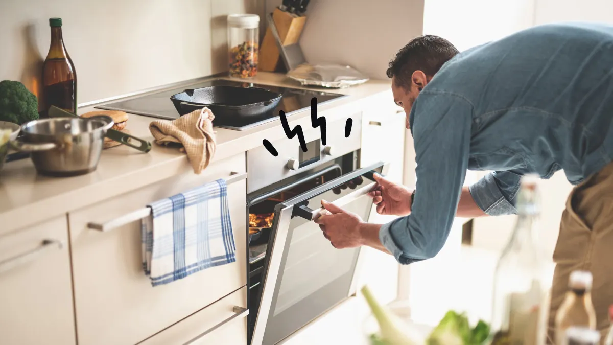 Man looking into the LG oven F9 error