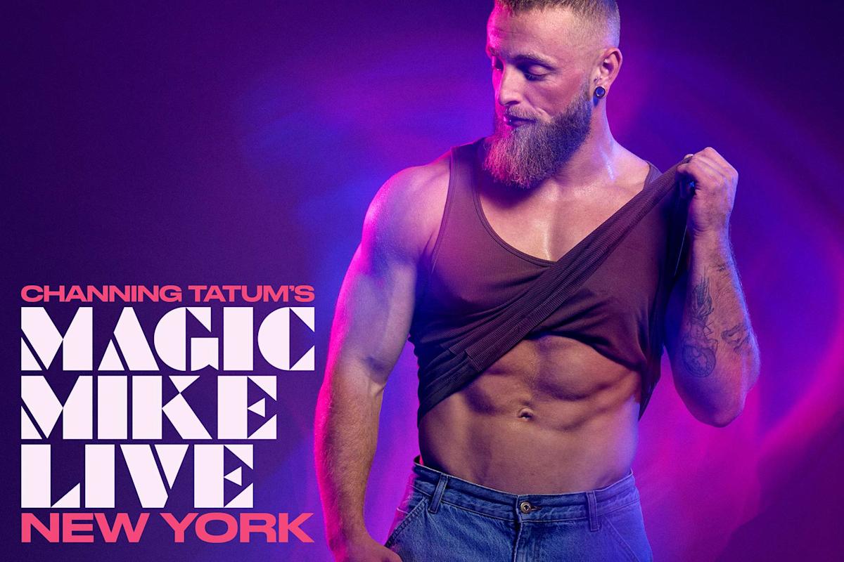 A muscular man with a beard lifts his brown tank top to reveal his abs. Purple and blue lighting creates a dramatic background. Text reads: "Channing Tatum's Magic Mike Live New York.