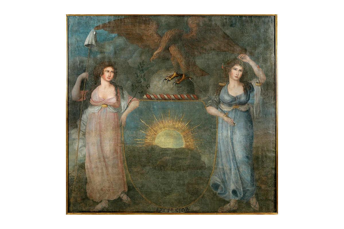 Two women in flowing robes stand on either side of a shield featuring a rising sun. An eagle perches above the shield, holding it with its claws. The background is dark and cloudy, adding a mystical, symbolic atmosphere.