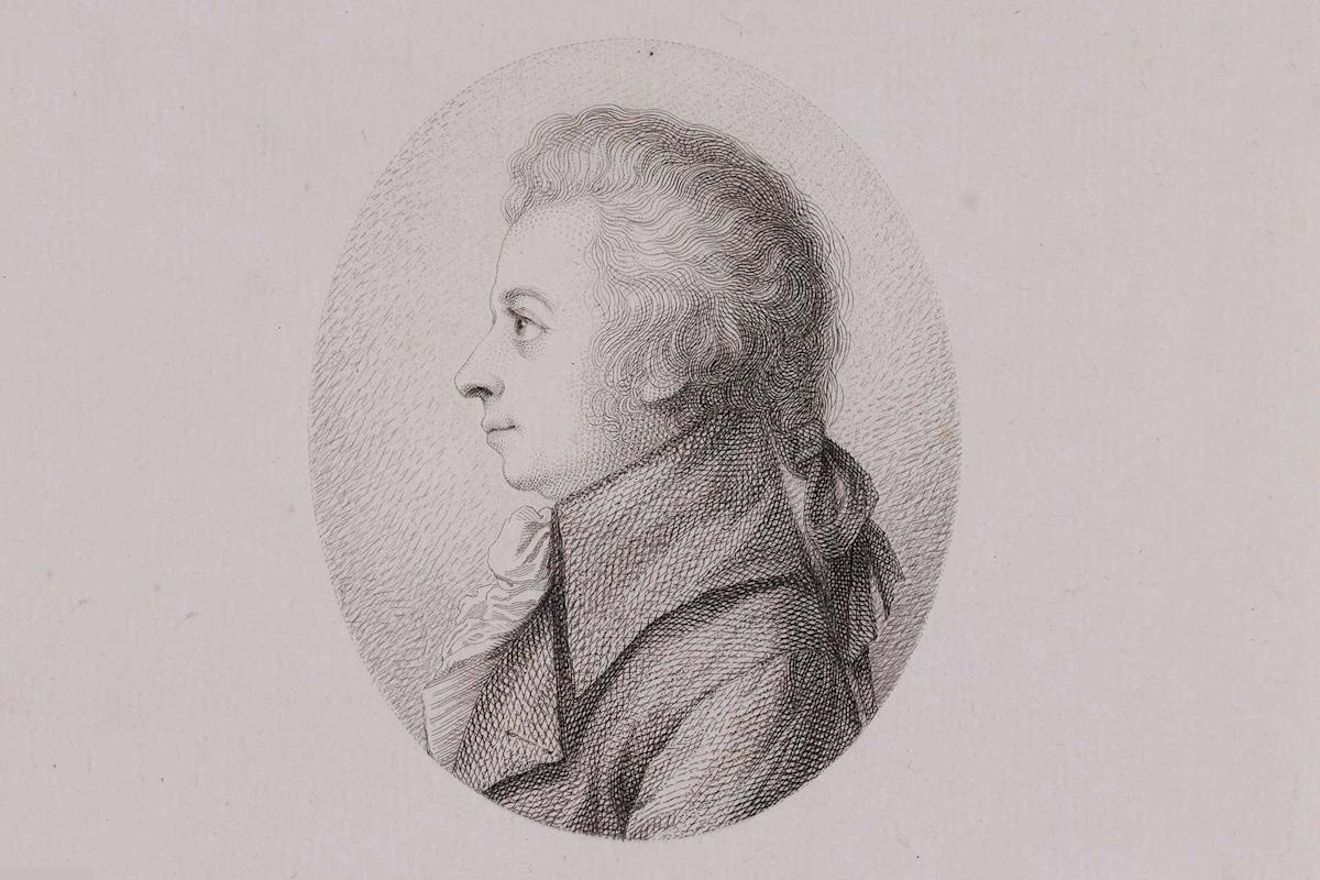 An old-fashioned, black and white oval portrait drawing of a man in profile facing left, wearing a high-collared coat and ruffled shirt, with curly hair. The background is plain and light-colored.