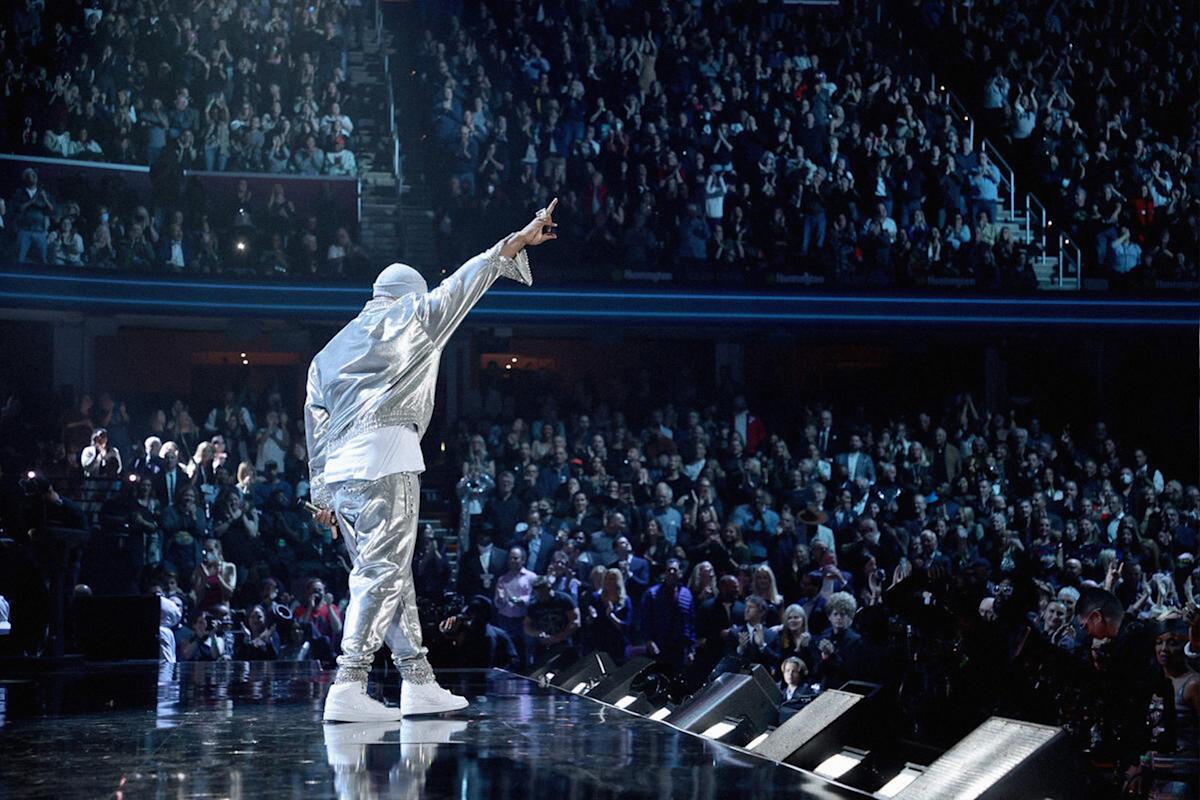 Person on stage, Rock and Roll Hall of Fame induction ceremony